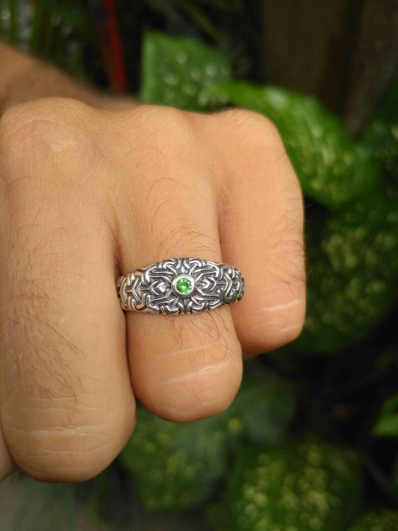 Spiritual silver mandala ring with detailed circular pattern