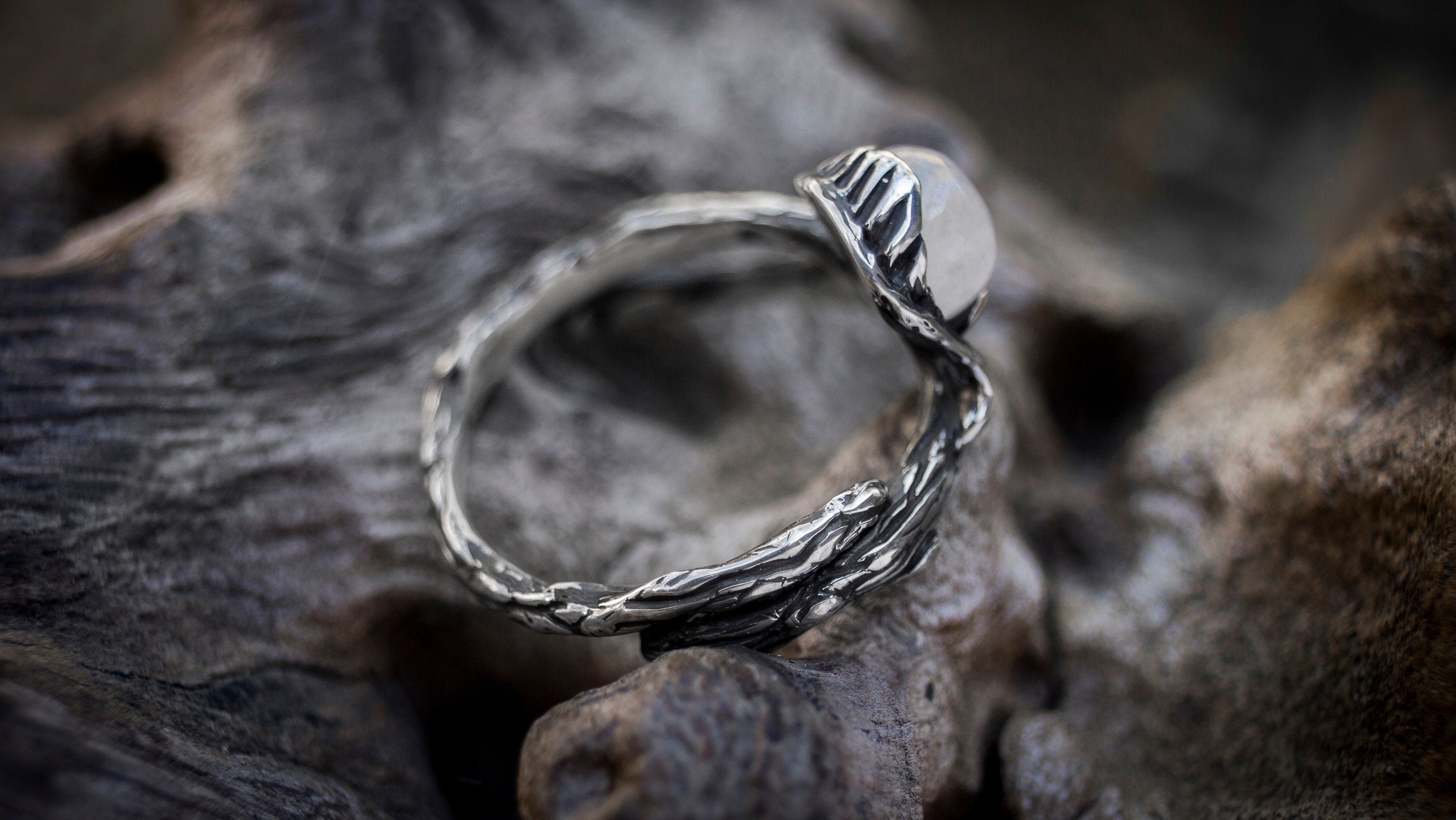 Side view of silver branch ring with organic tree texture