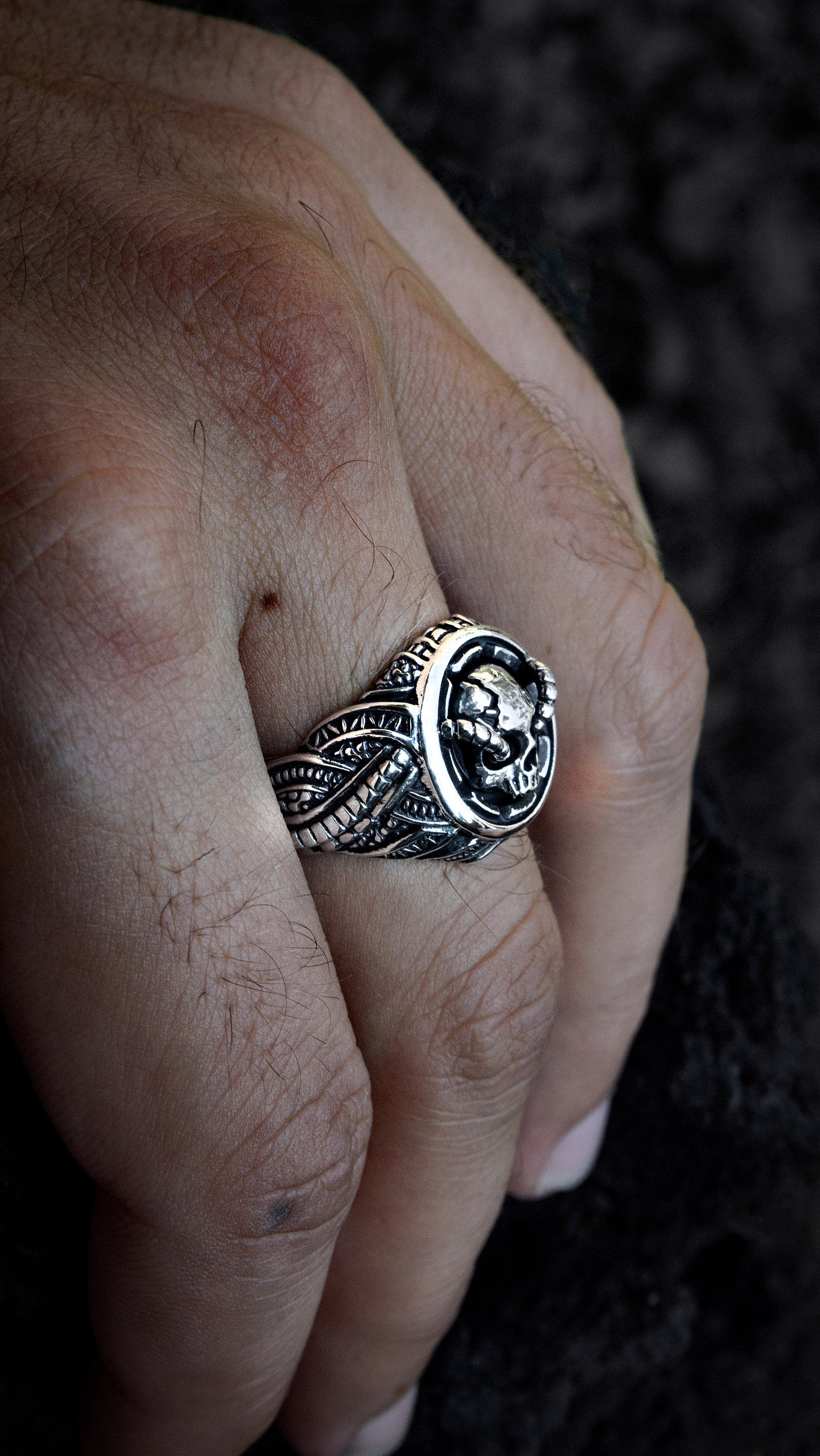 Handmade Biomech Skull ring shown from vertical angle