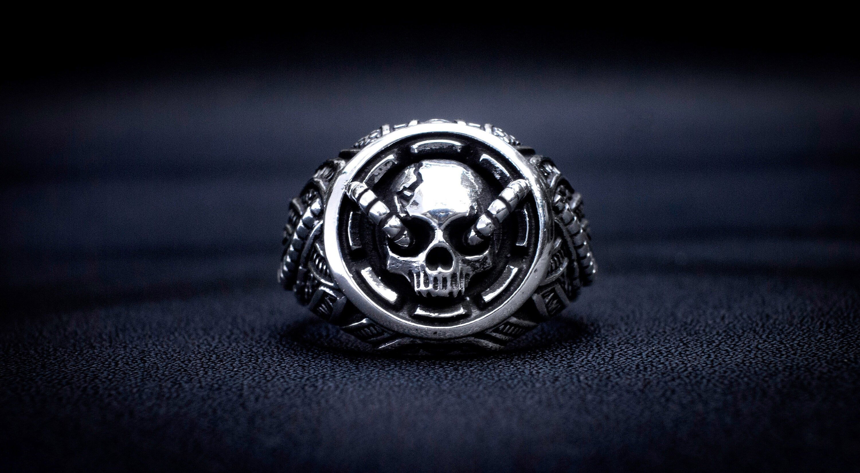 Handmade silver ring with dark sculptural details