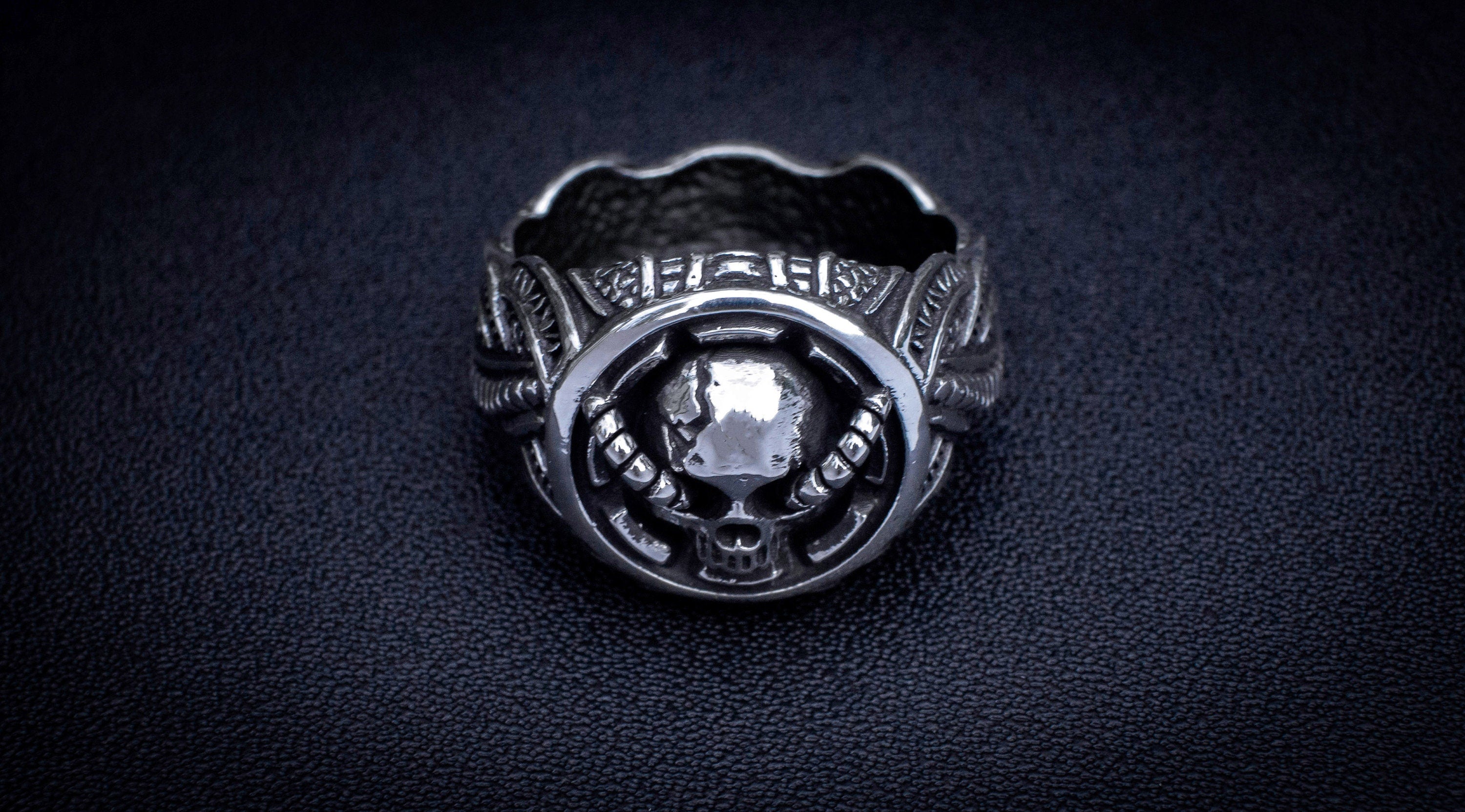 Sculptural silver ring shown from angled profile