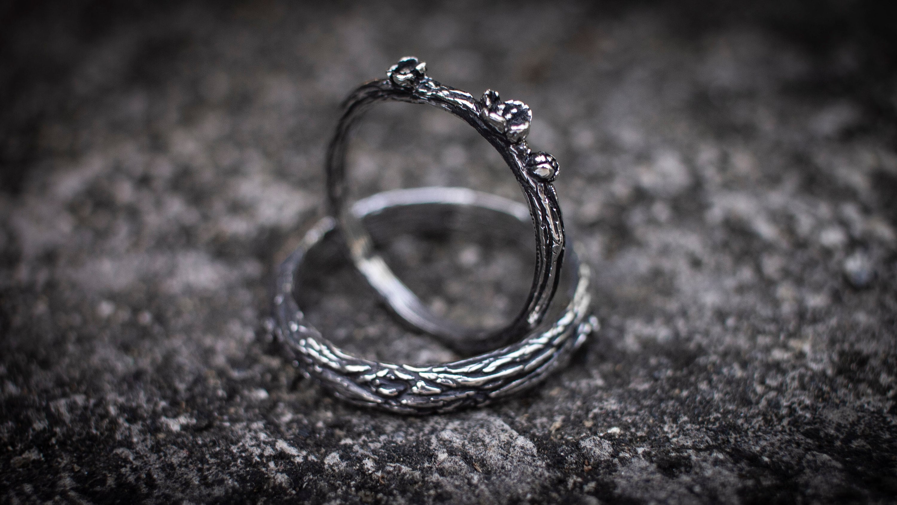 Textured sterling silver wedding ring set with rustic finish