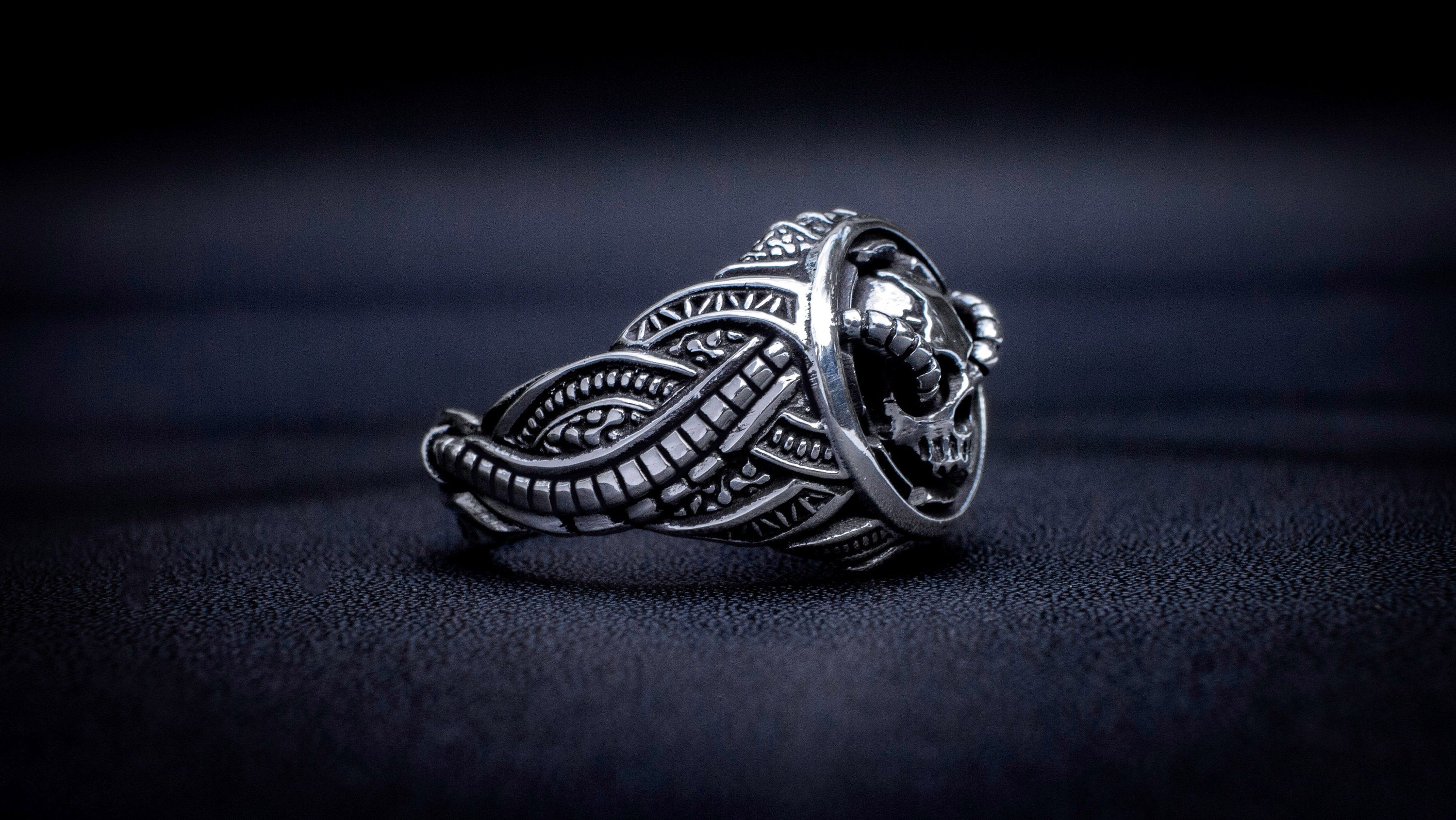 Side view of handmade silver skull statement ring