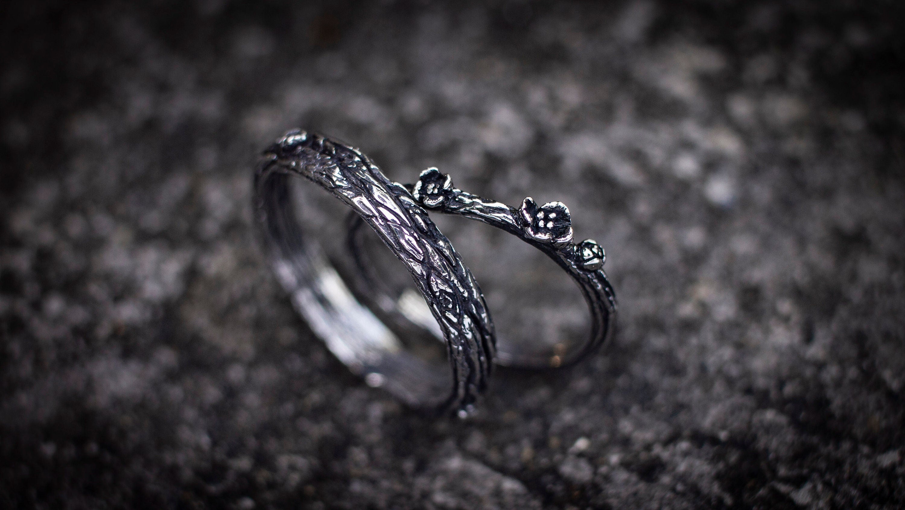 Matching silver wedding bands inspired by natural bark texture