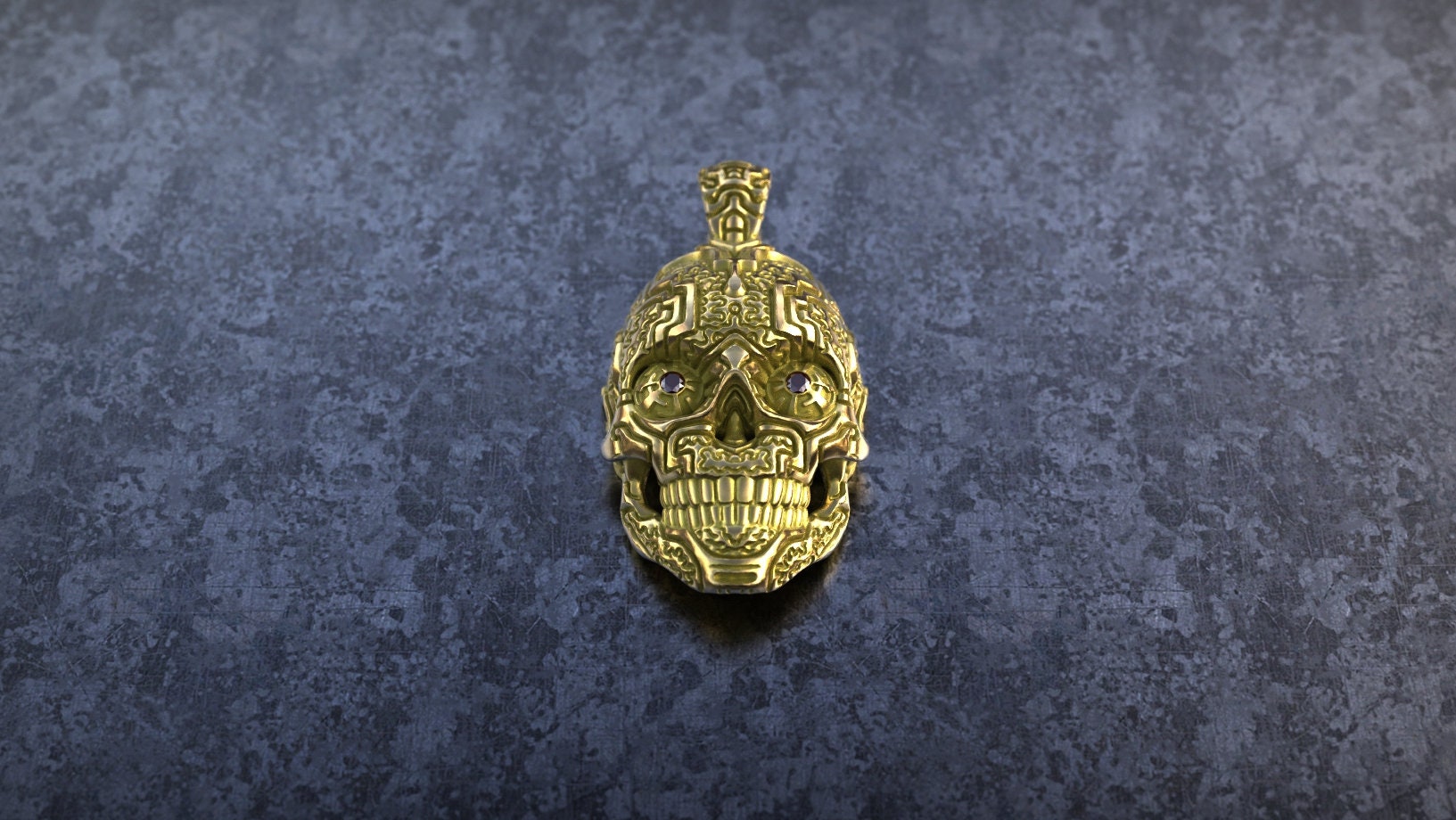 Gold skull pendant photographed from front angle