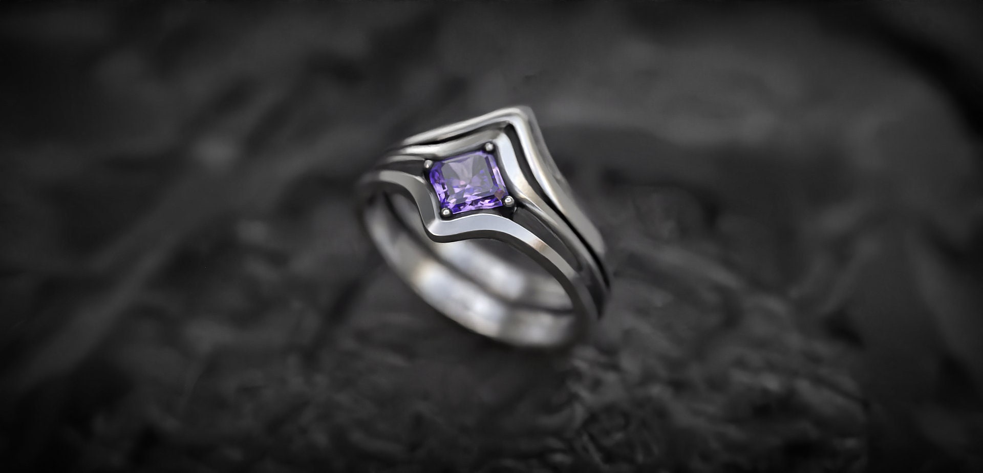 Amethyst silver ring set photographed from front angle