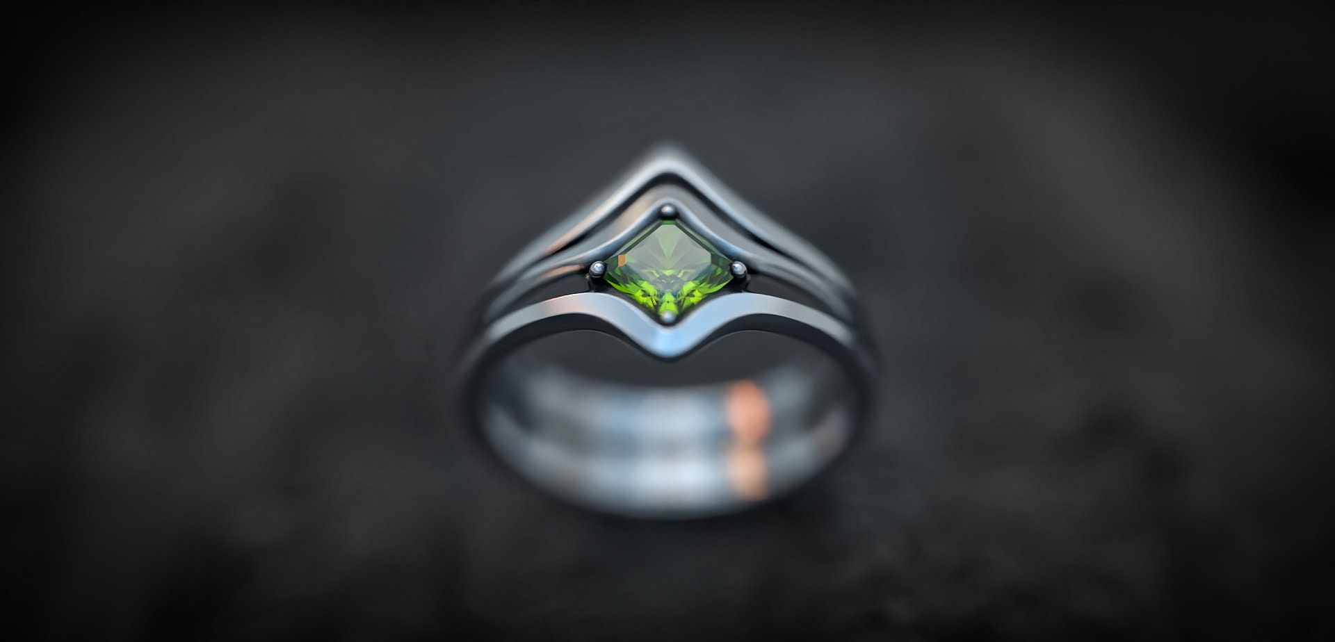 Sterling silver engagement ring set displayed on dark background