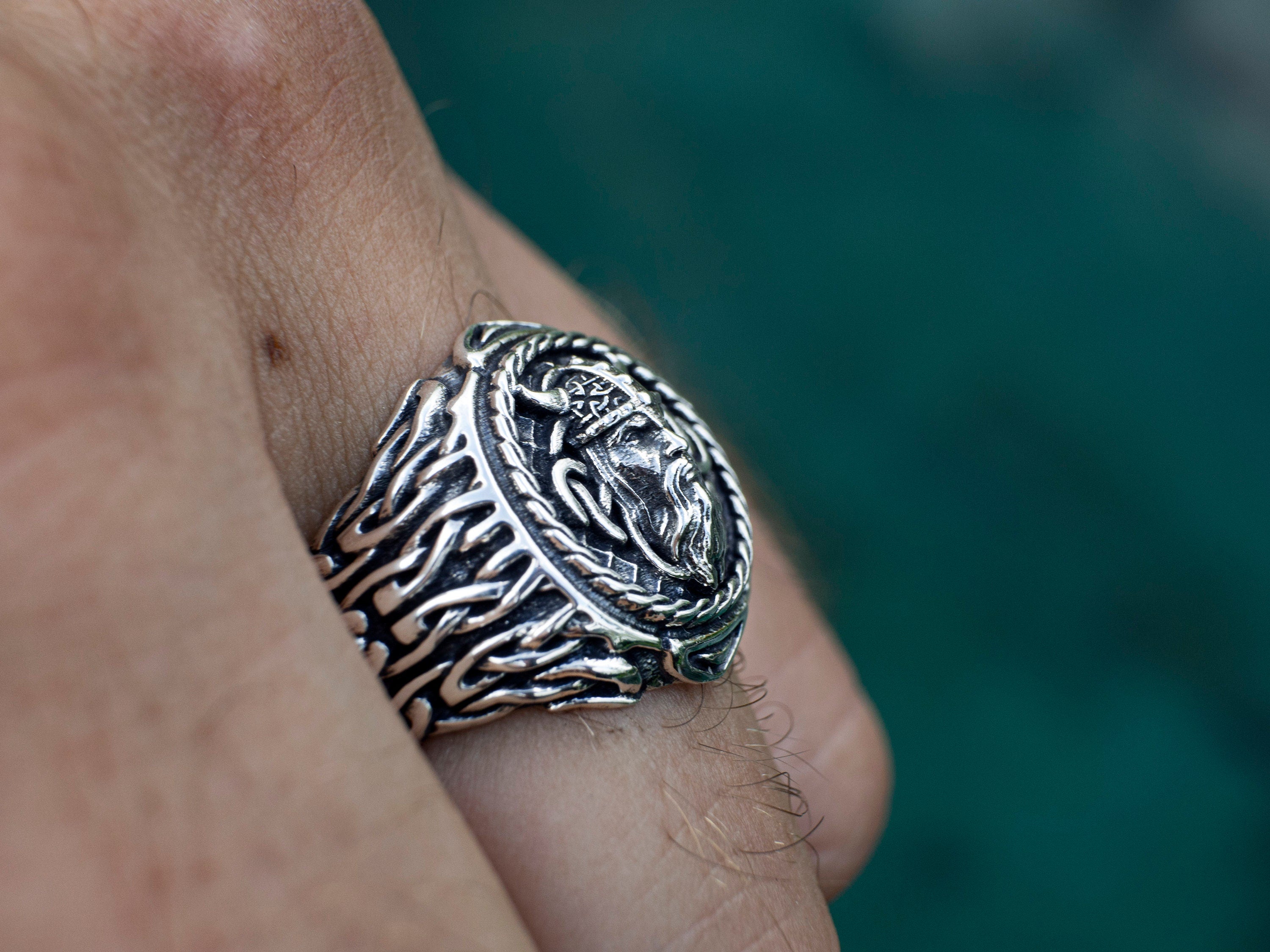 Silver Viking ring with sculptural head and knotwork