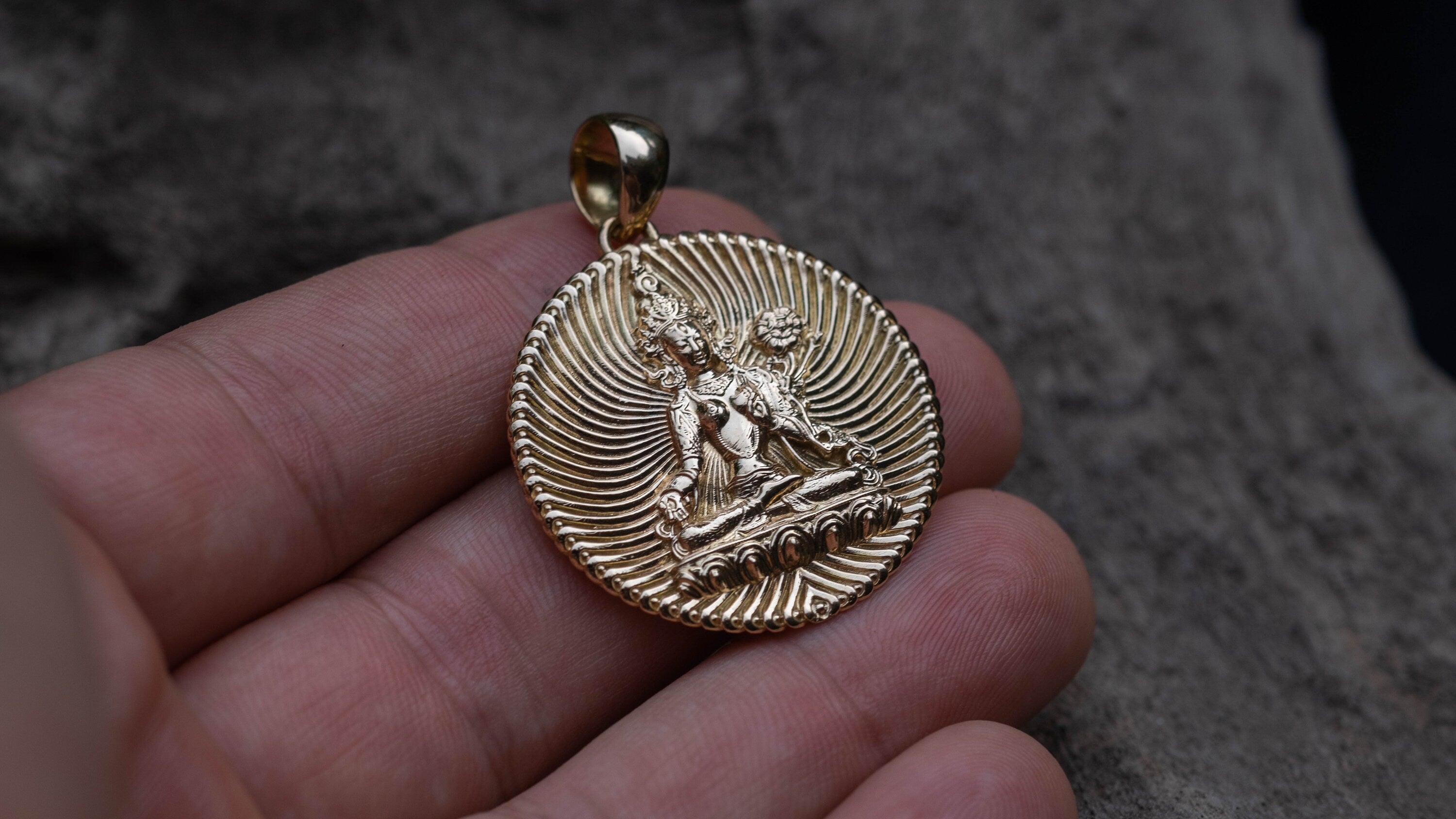 14K gold Tara necklace shown from angled view