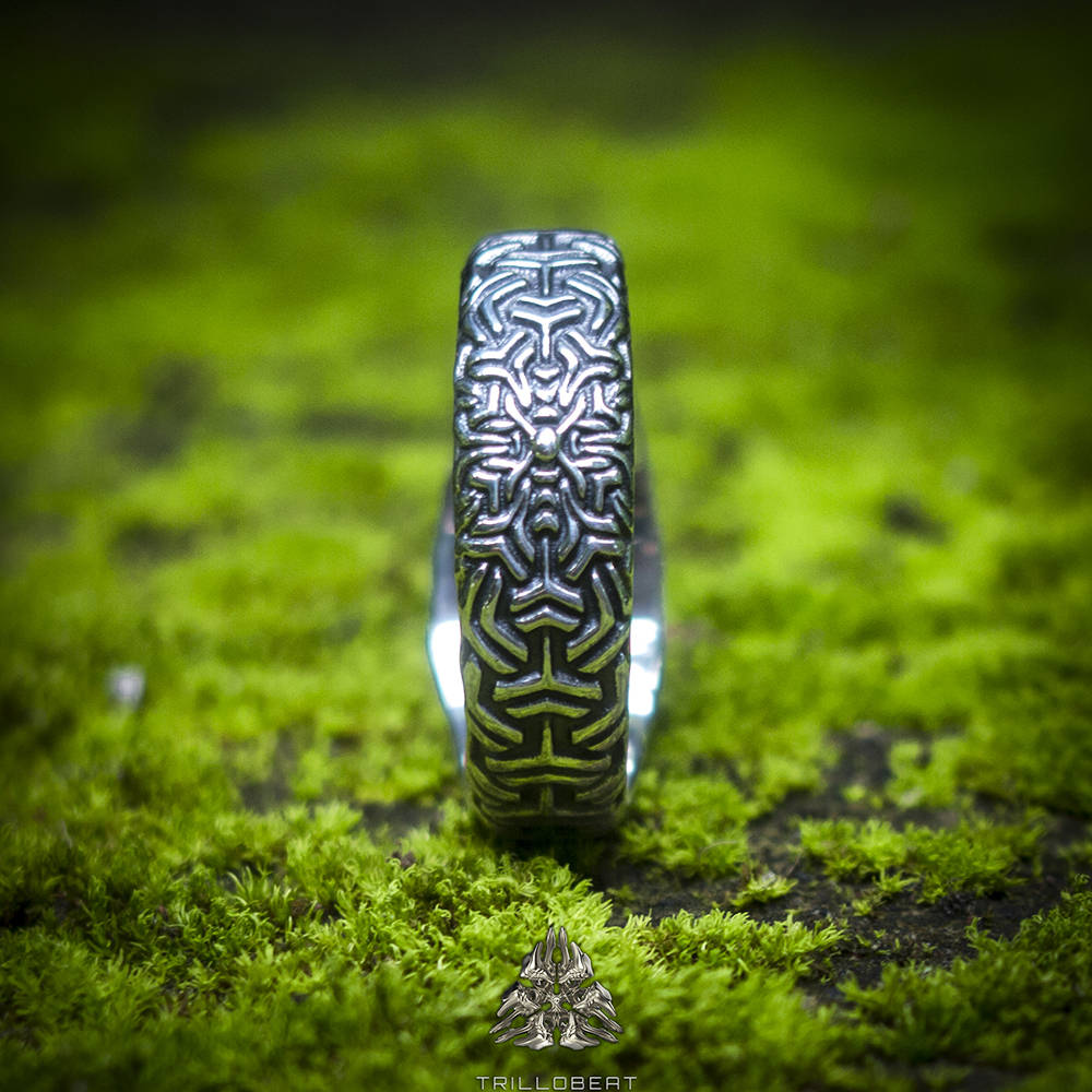 Side view of handmade mandala ring in sterling silver