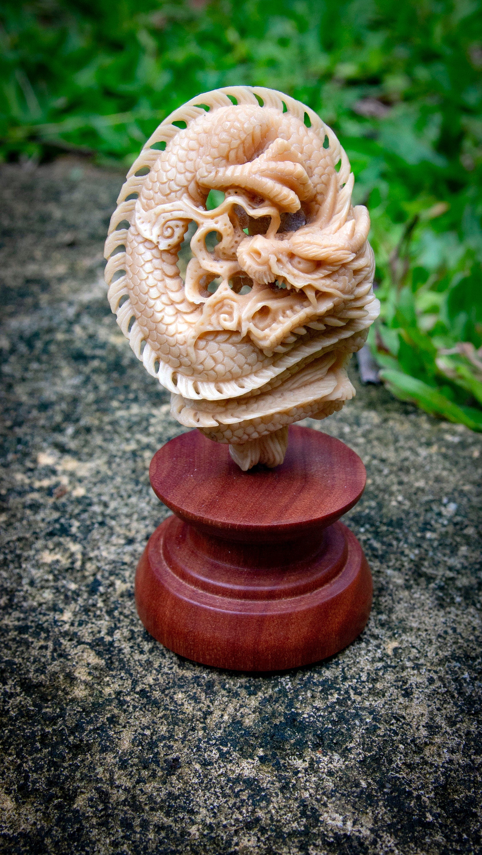 Dragon statue shown from angled side profile