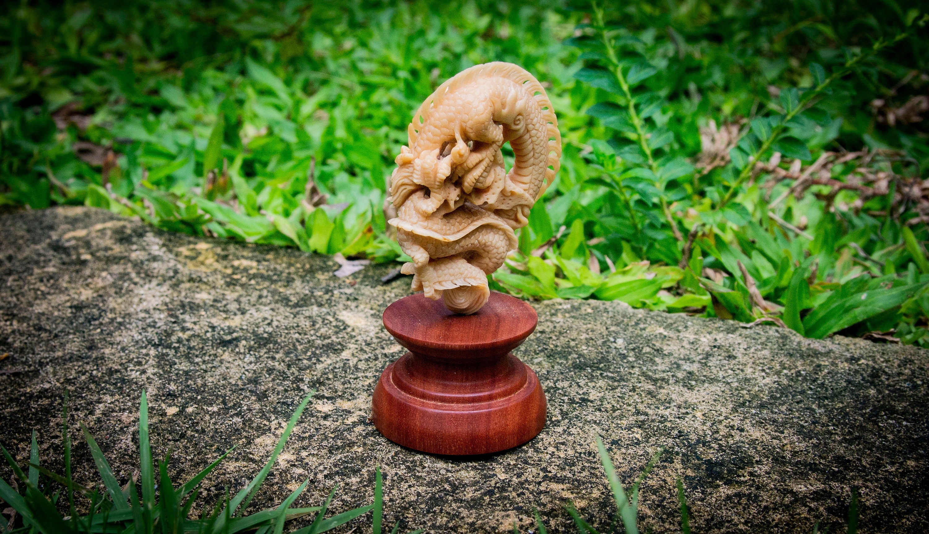 Collectible dragon figurine displayed on dark background