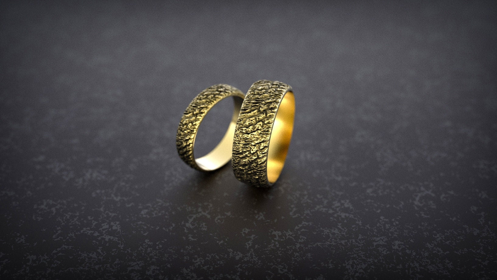 Matching gold wedding bands photographed together