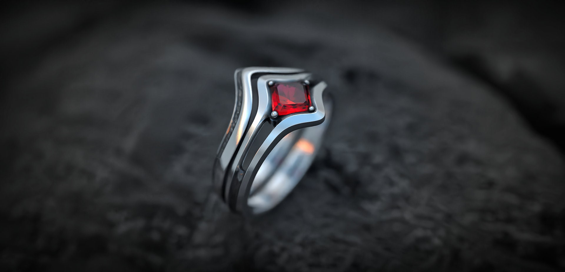 Side view of silver stacking engagement ring set