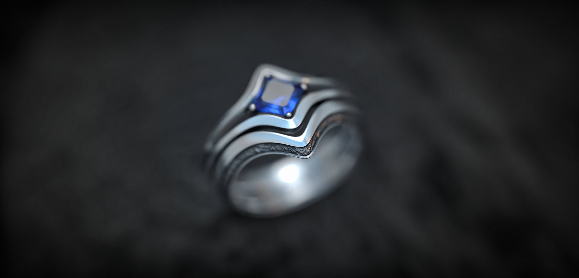 Silver amethyst jewelry shown from angled profile