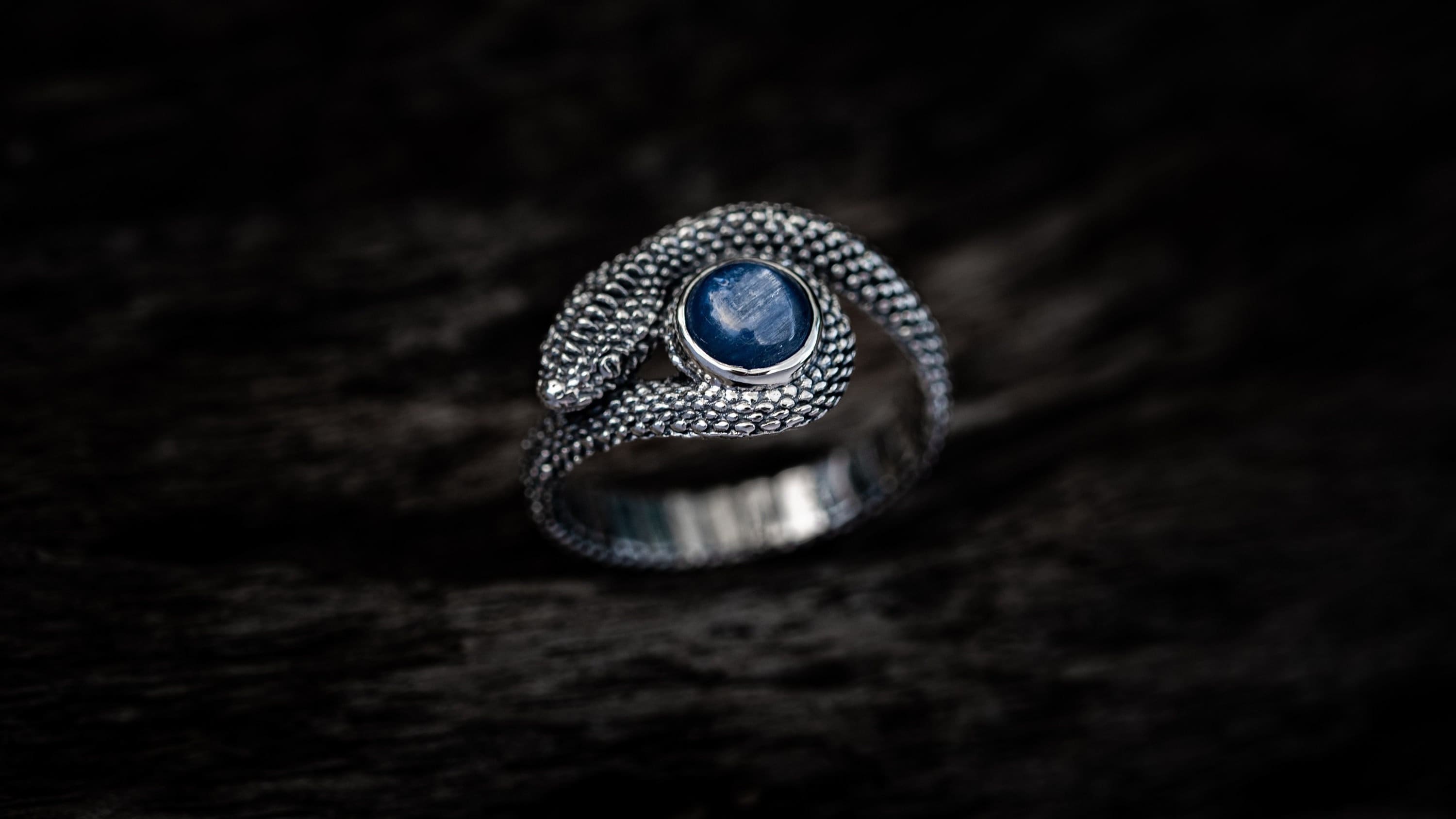 Side view of handmade silver snake ring