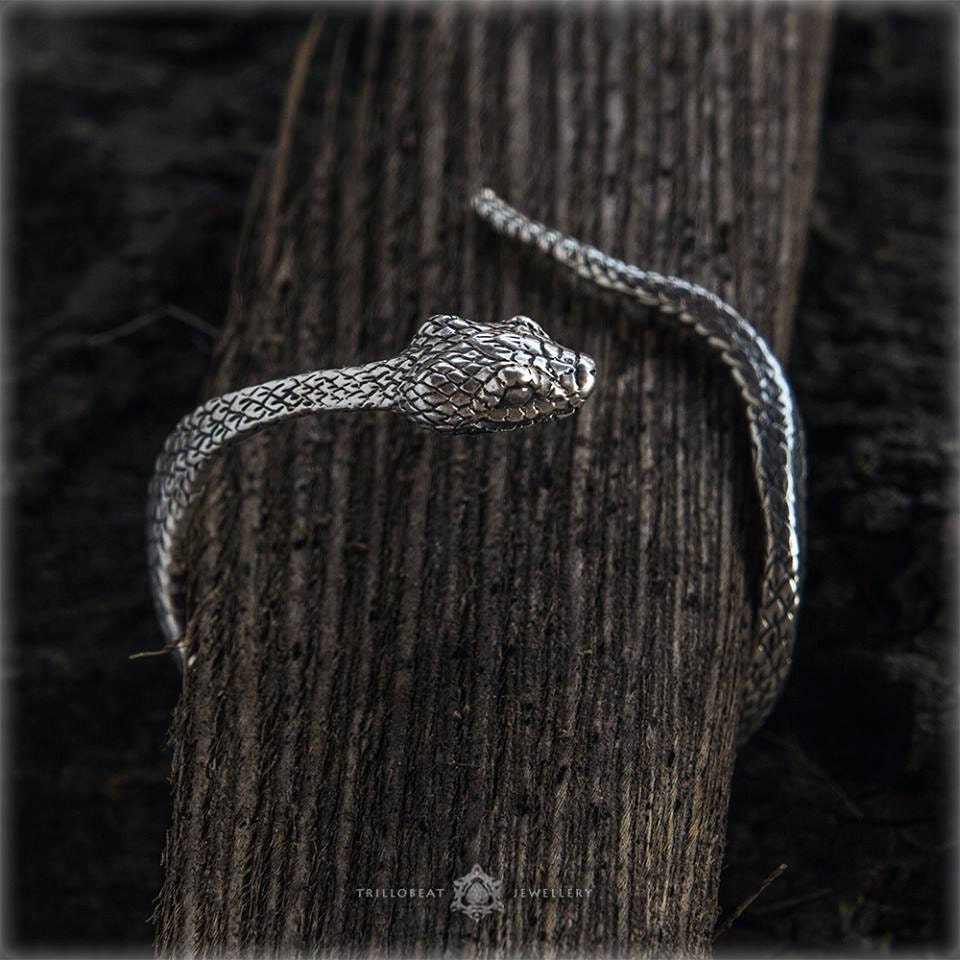 Side view of handmade silver snake bangle