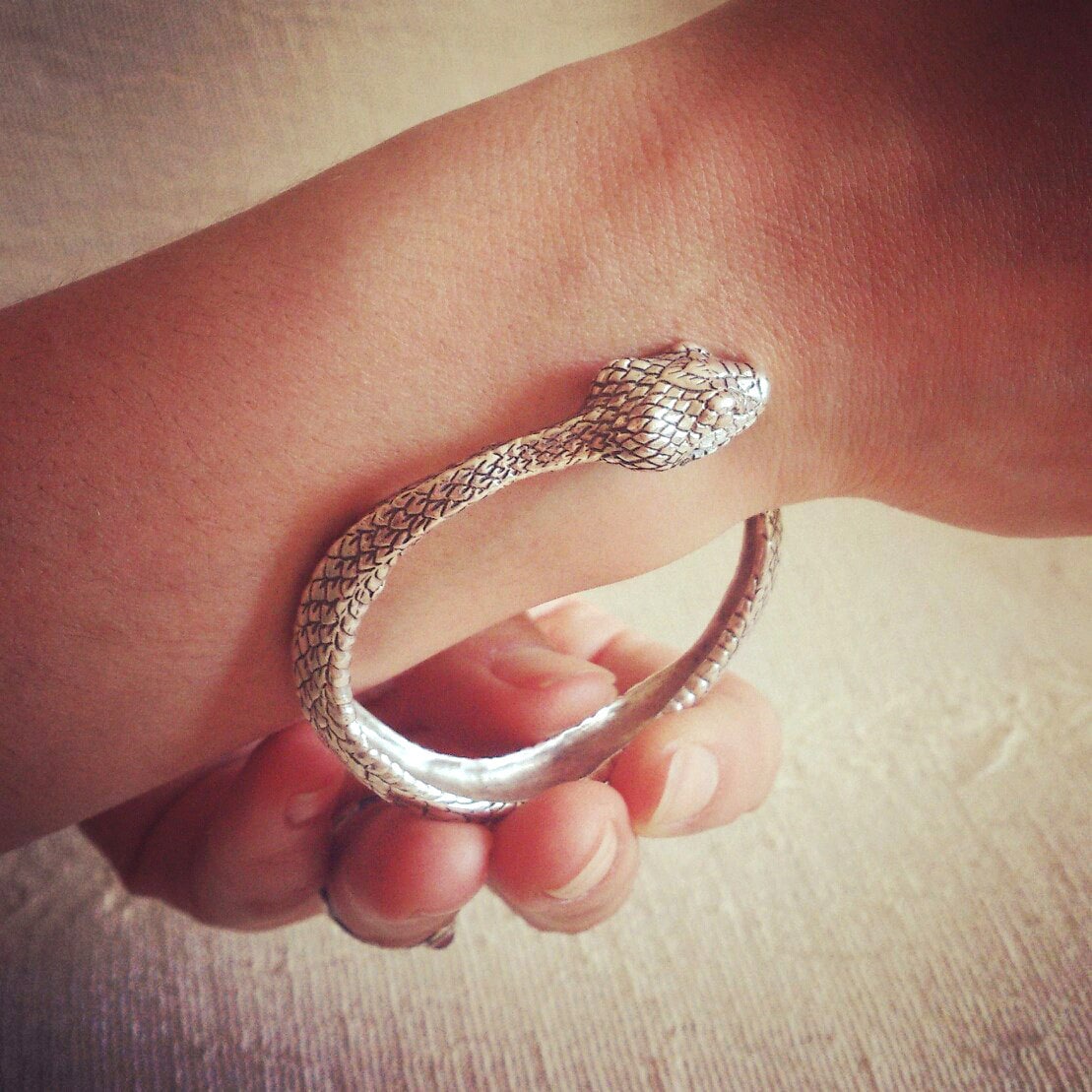 Silver snake bracelet with sculptural scale pattern